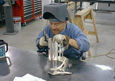 custom metal fabrication worker
